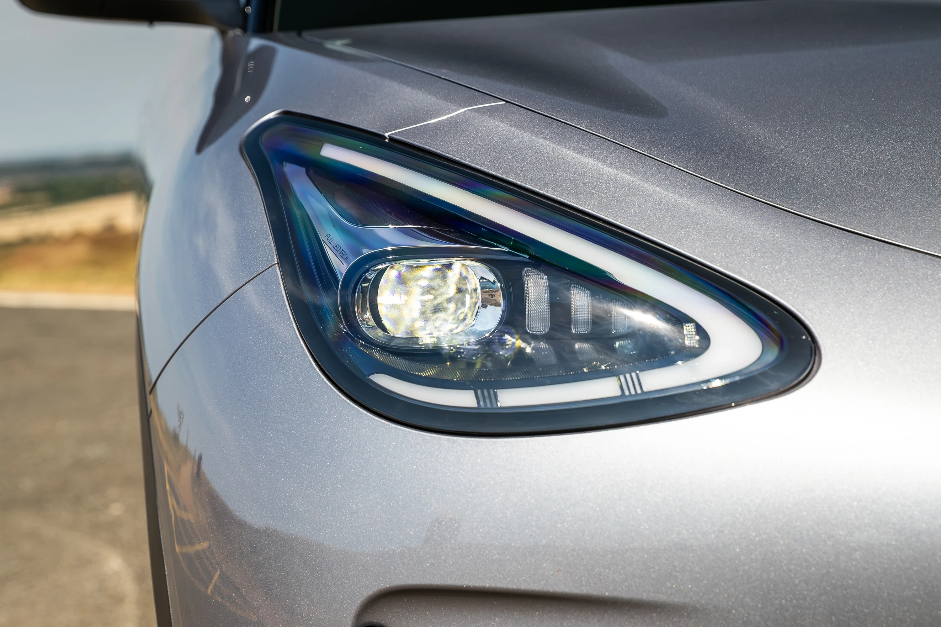 Geely EX2 47.1 kWh headlights view