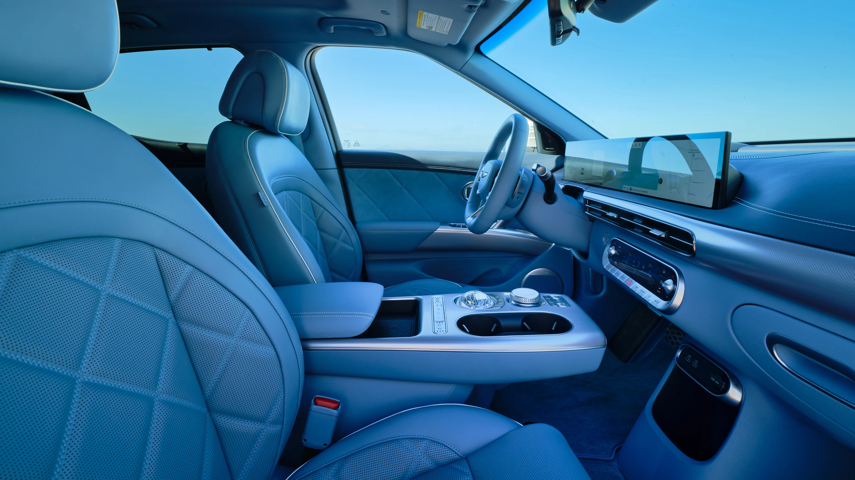 Genesis GV60 2026 Performance AWD frontseats view