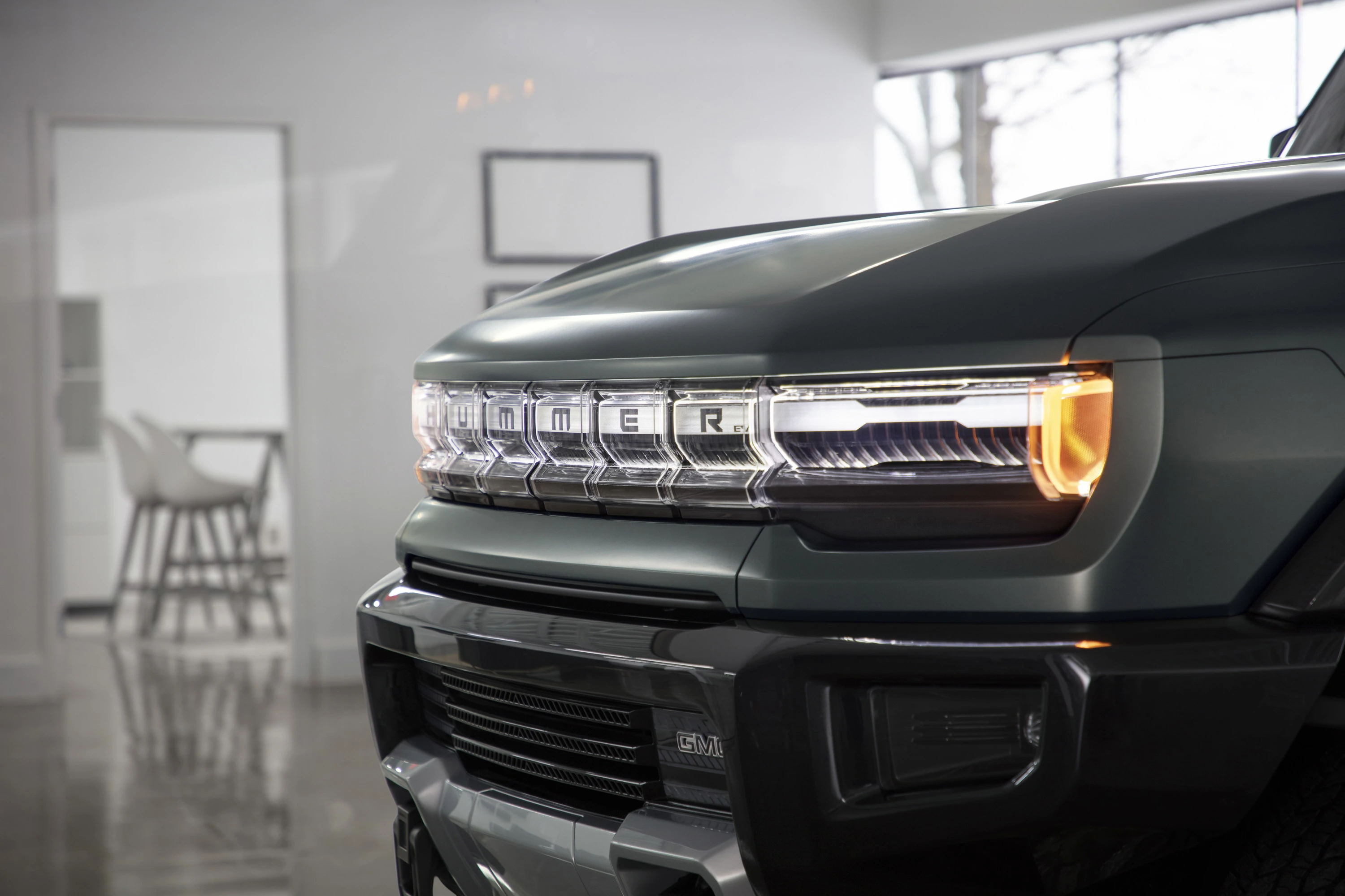 GMC Hummer EV SUV 3x headlights view