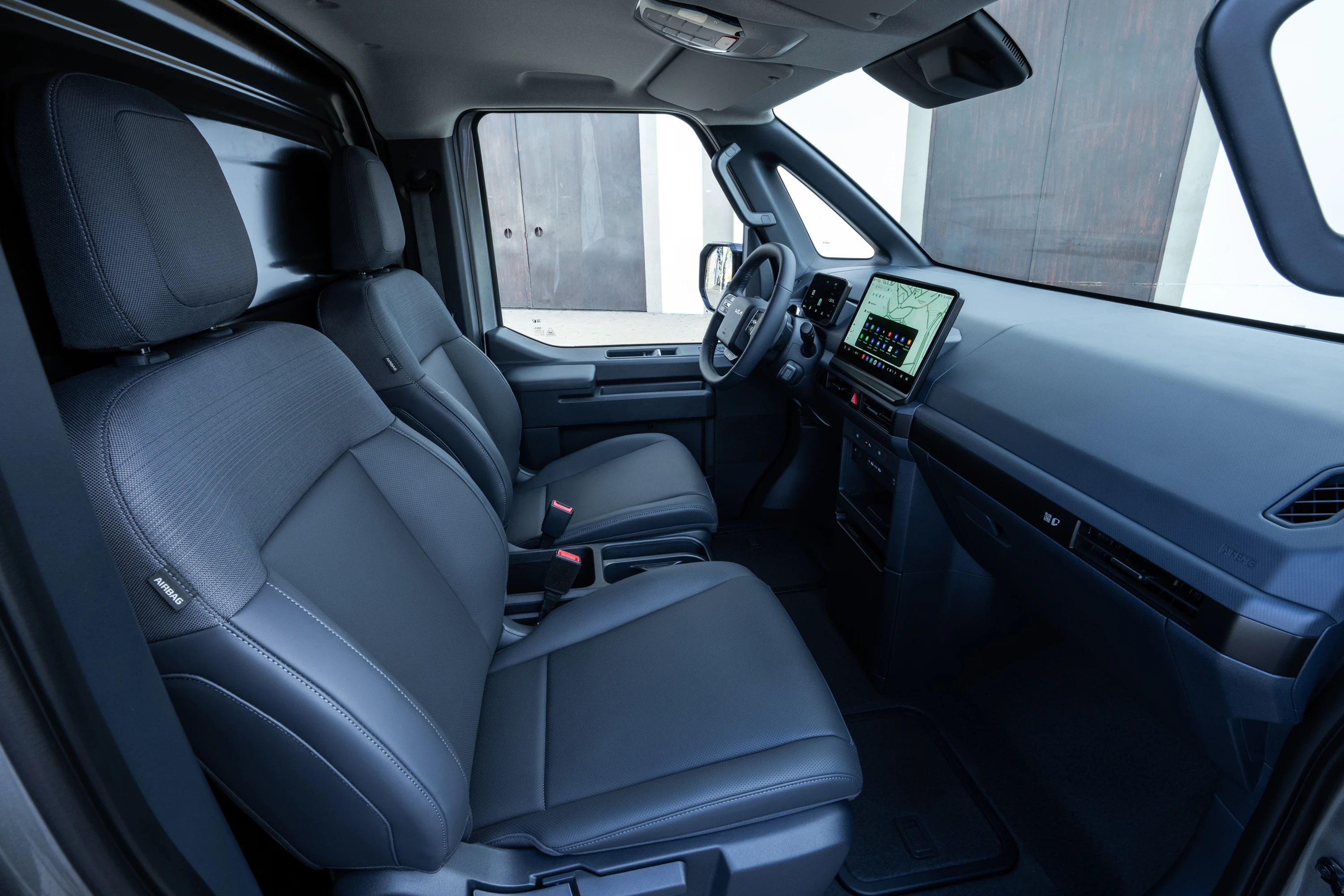 Kia PV5 Cargo Standard Range frontseats view