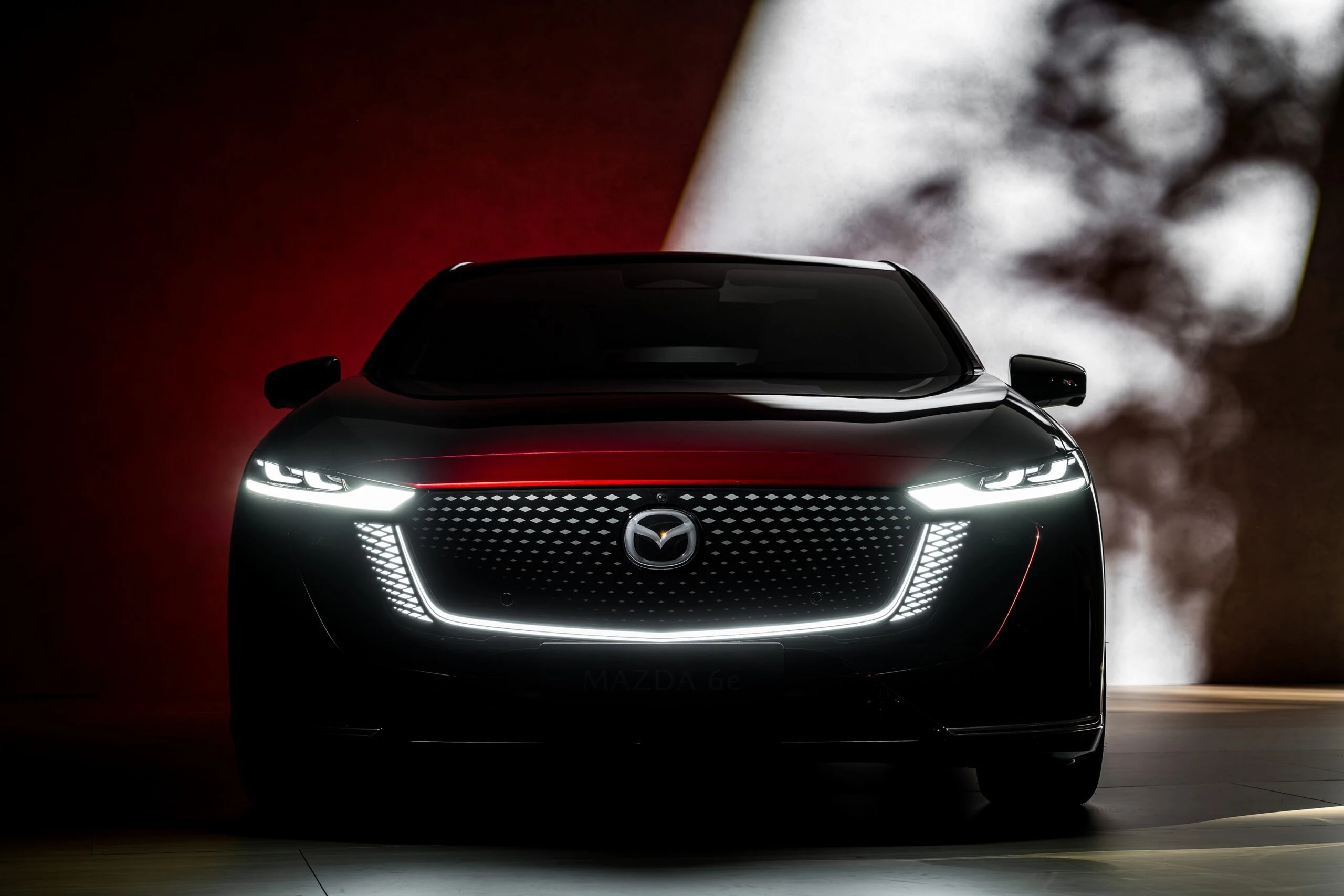 Mazda 6e 78 kWh headlights view
