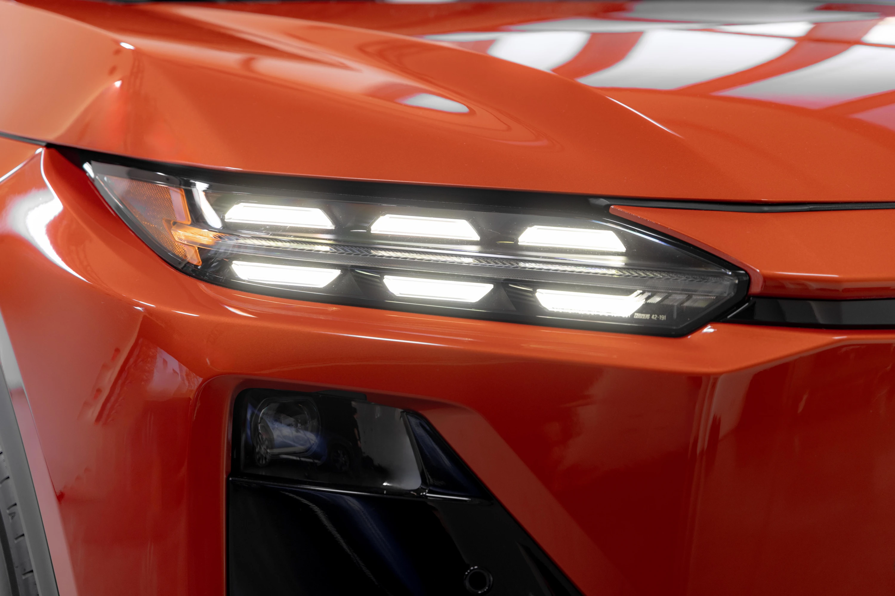 Subaru Uncharted AWD 77 kWh headlights view