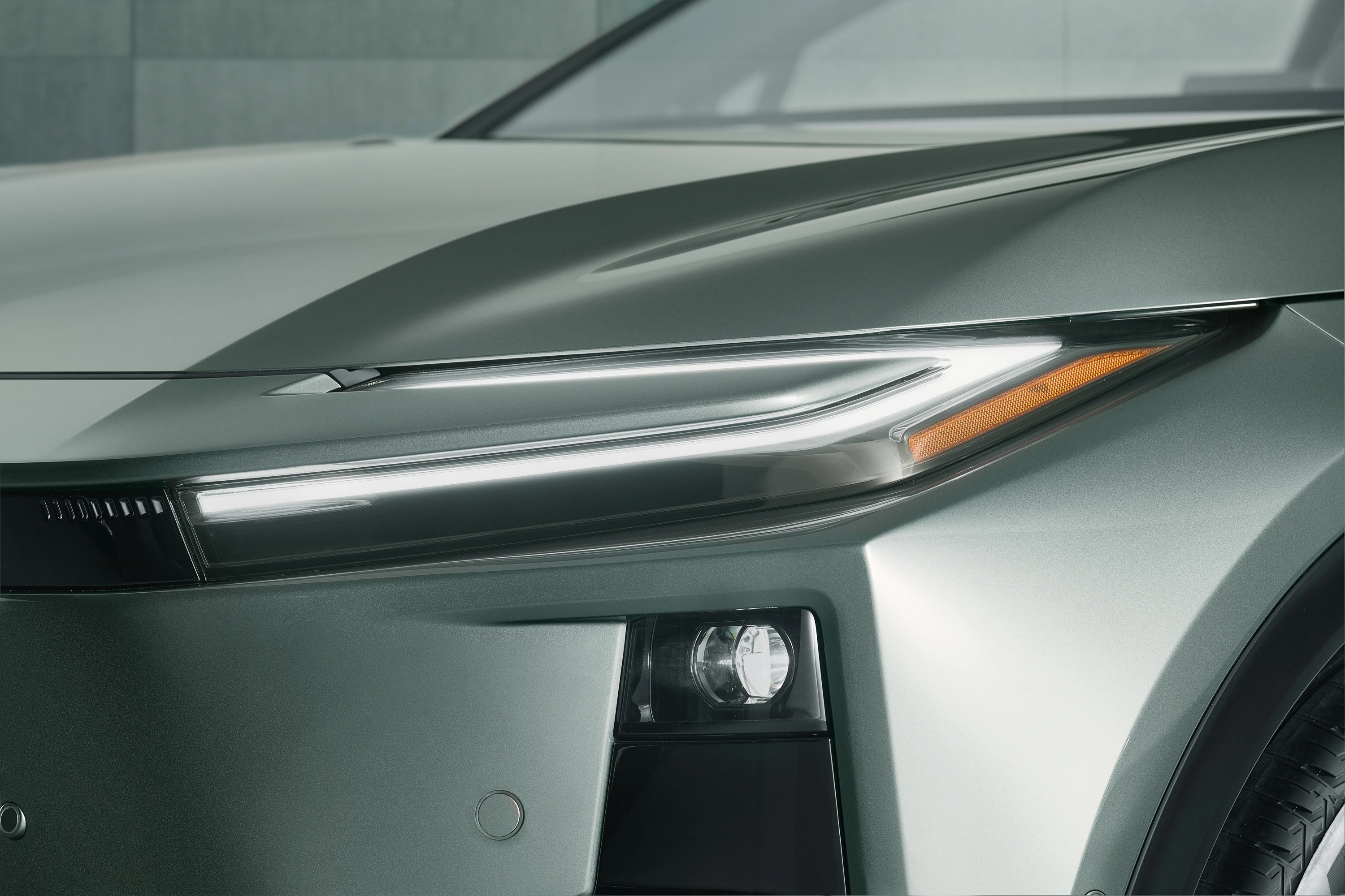 Toyota C-HR+ 57.7 kWh headlights view