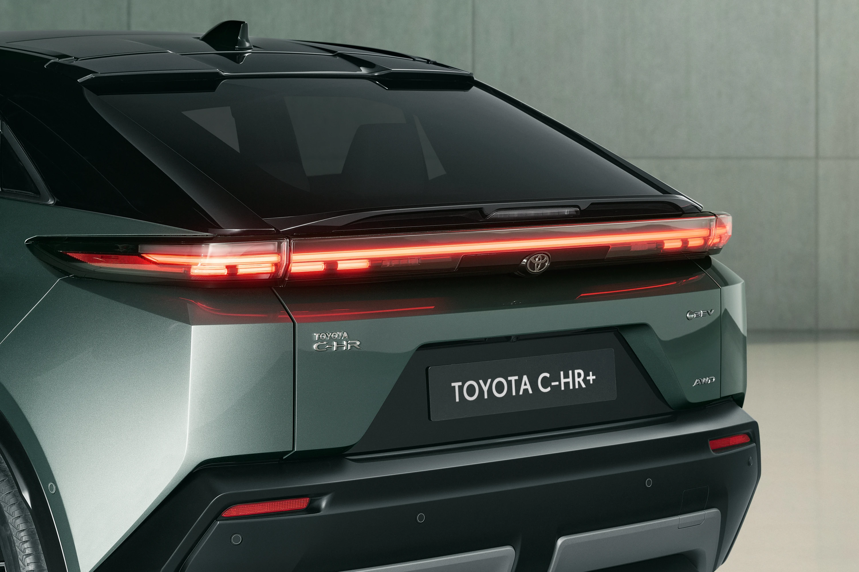 Toyota C-HR+ 57.7 kWh taillights view