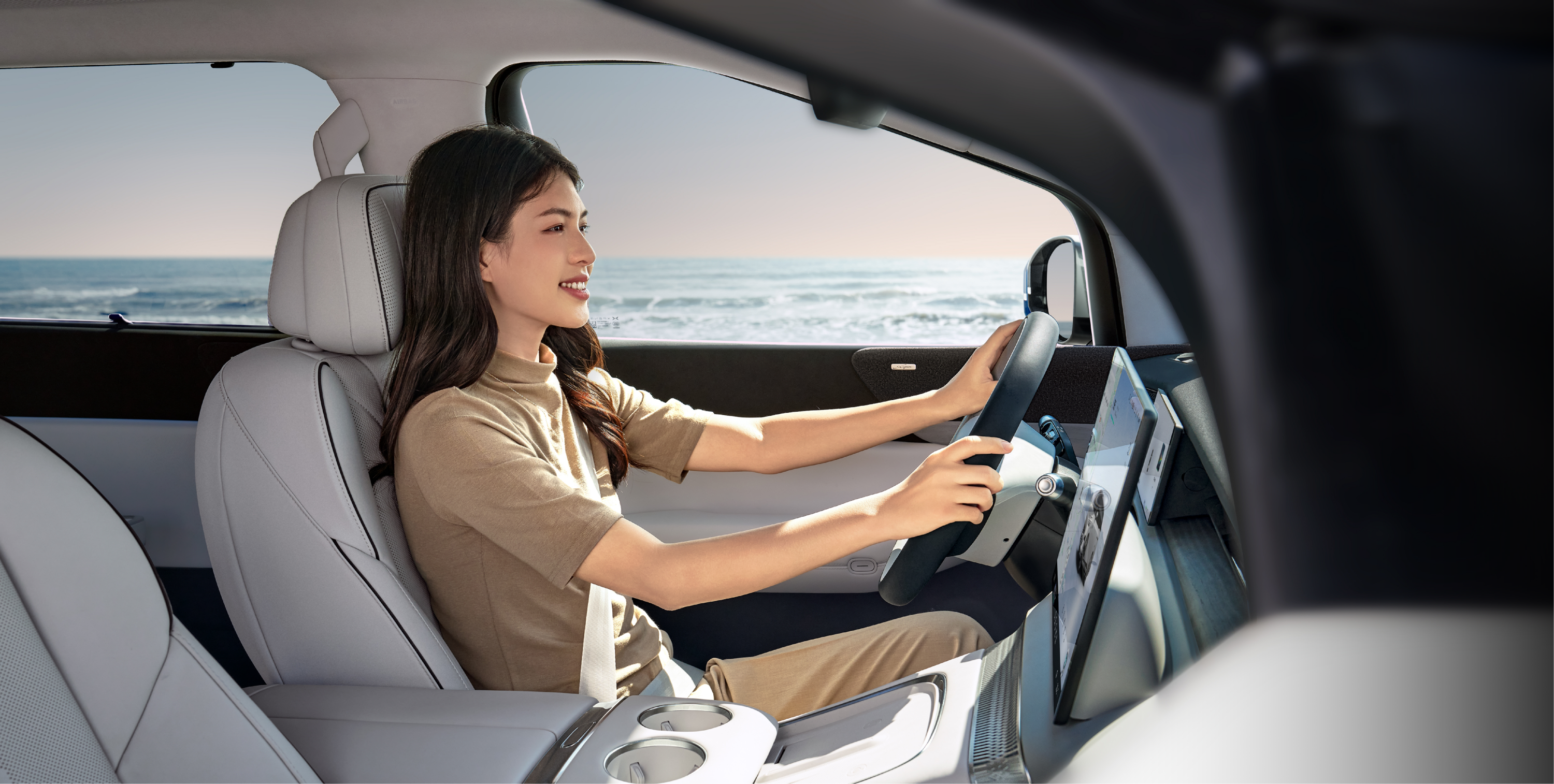 XPENG X9 AWD Performance frontseats view